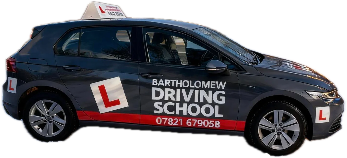 Bartholomew Driving School VW Golf with roof sign and L plates